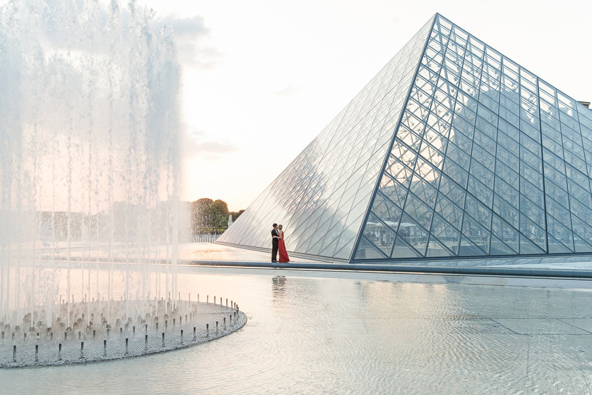 Paris photographer paris engagement photos Louvre Museum at sunrise